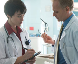 Doctor talking to nurse