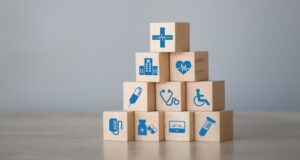 wood oblocks with medical symbols printed in blue ink on them